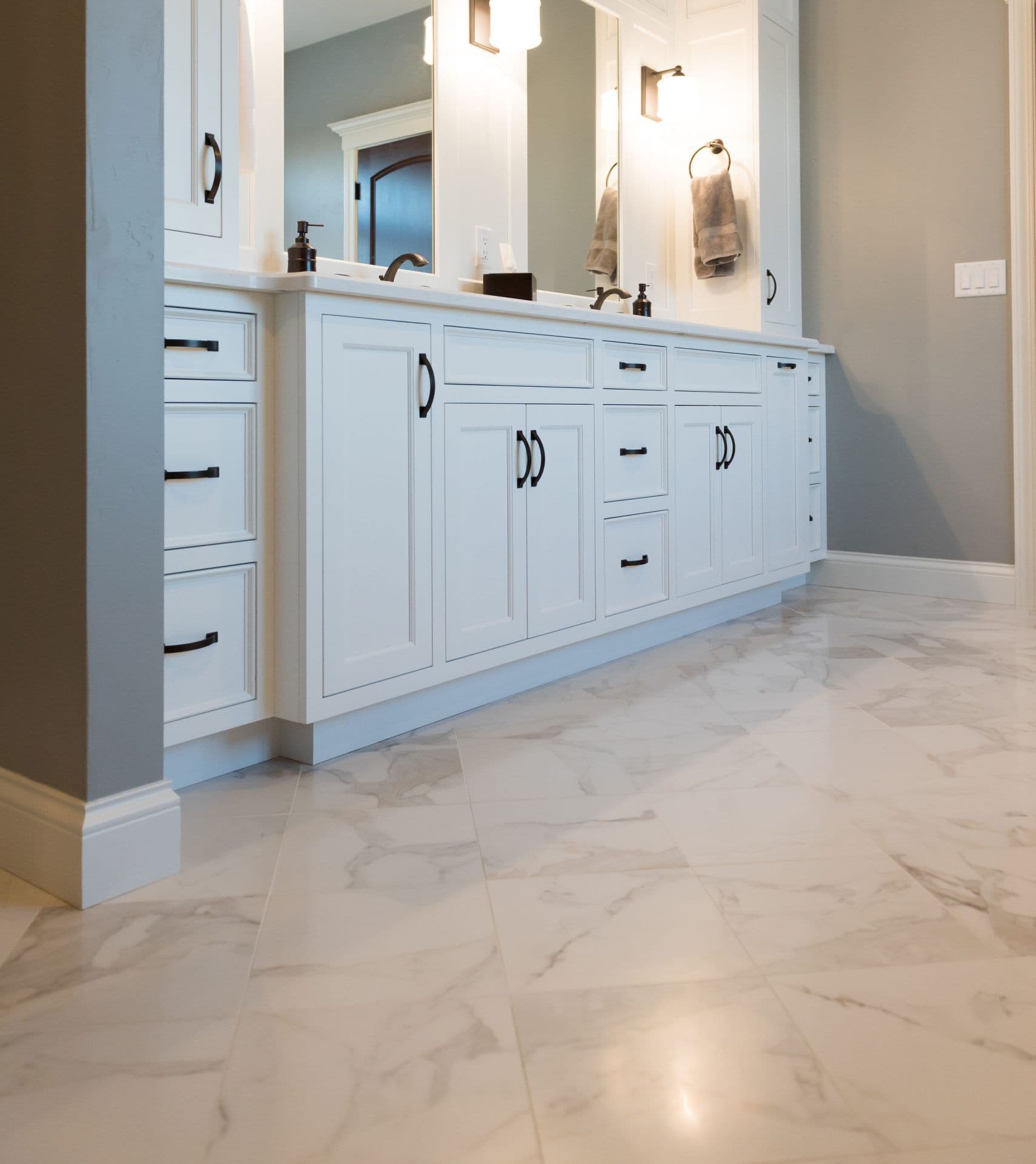 floorology bathroom trends 2026 white cabinets tile floor